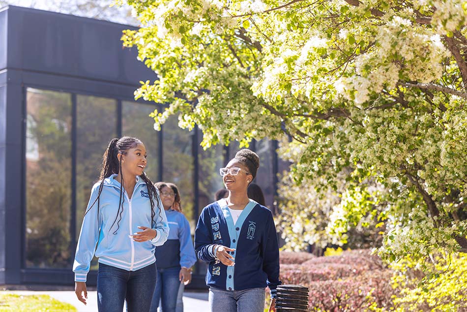 Students walking together across campus