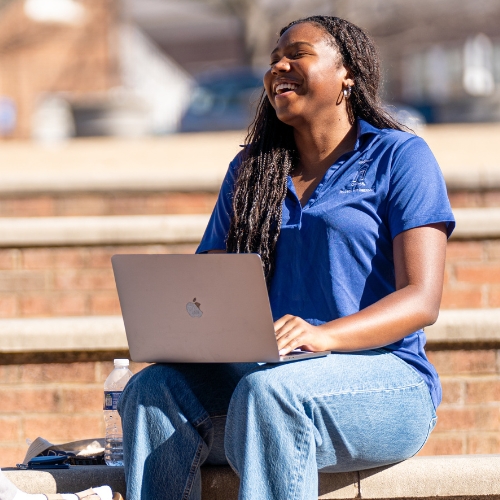Spelman student on a computer