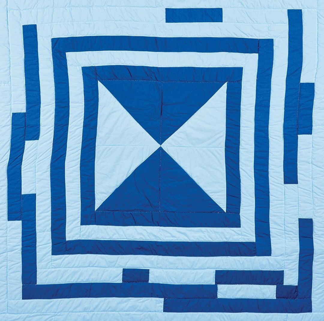 blue quilt part of threaded exhibit 